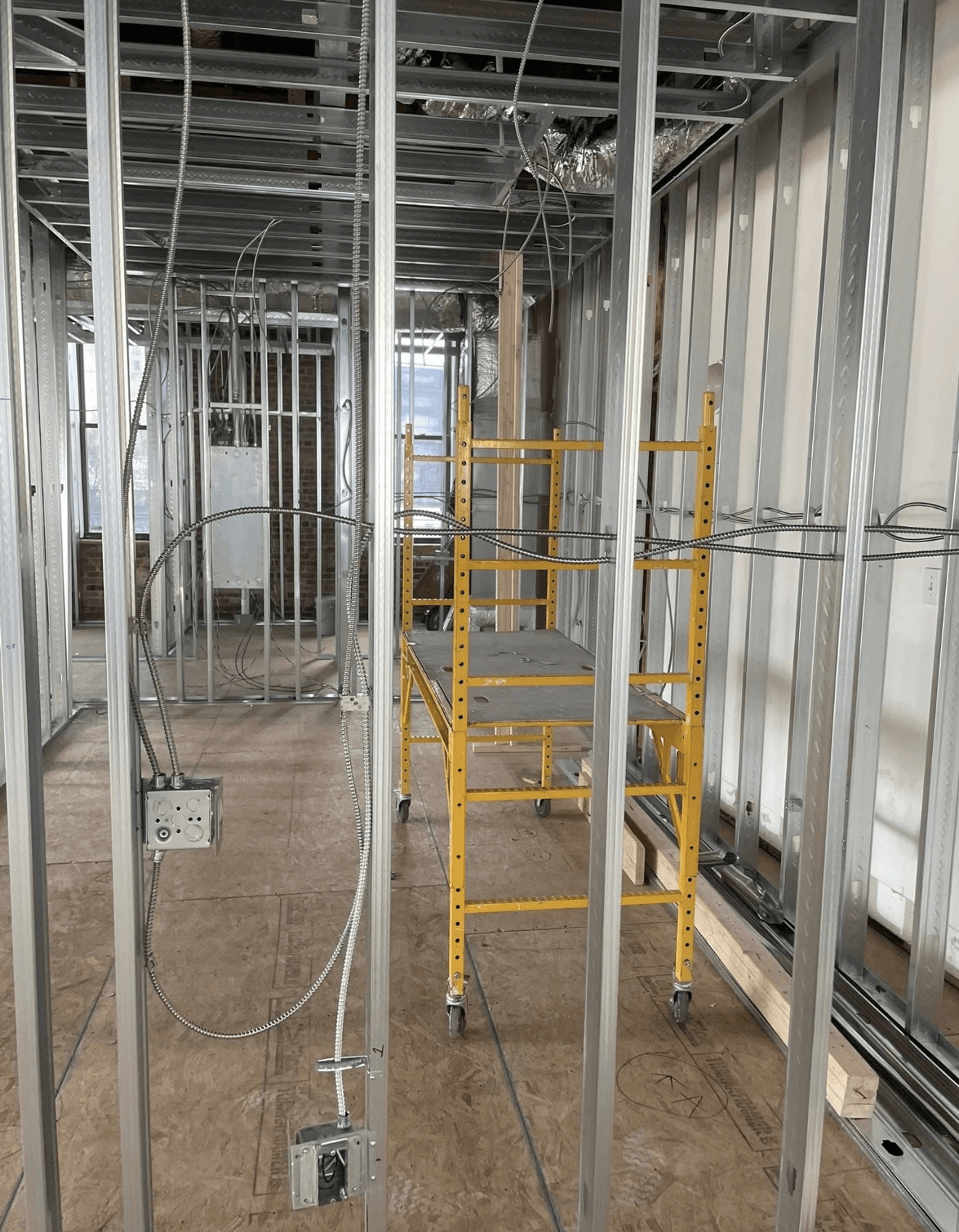 Commercial rough-in wiring and conduit runs on steel framing